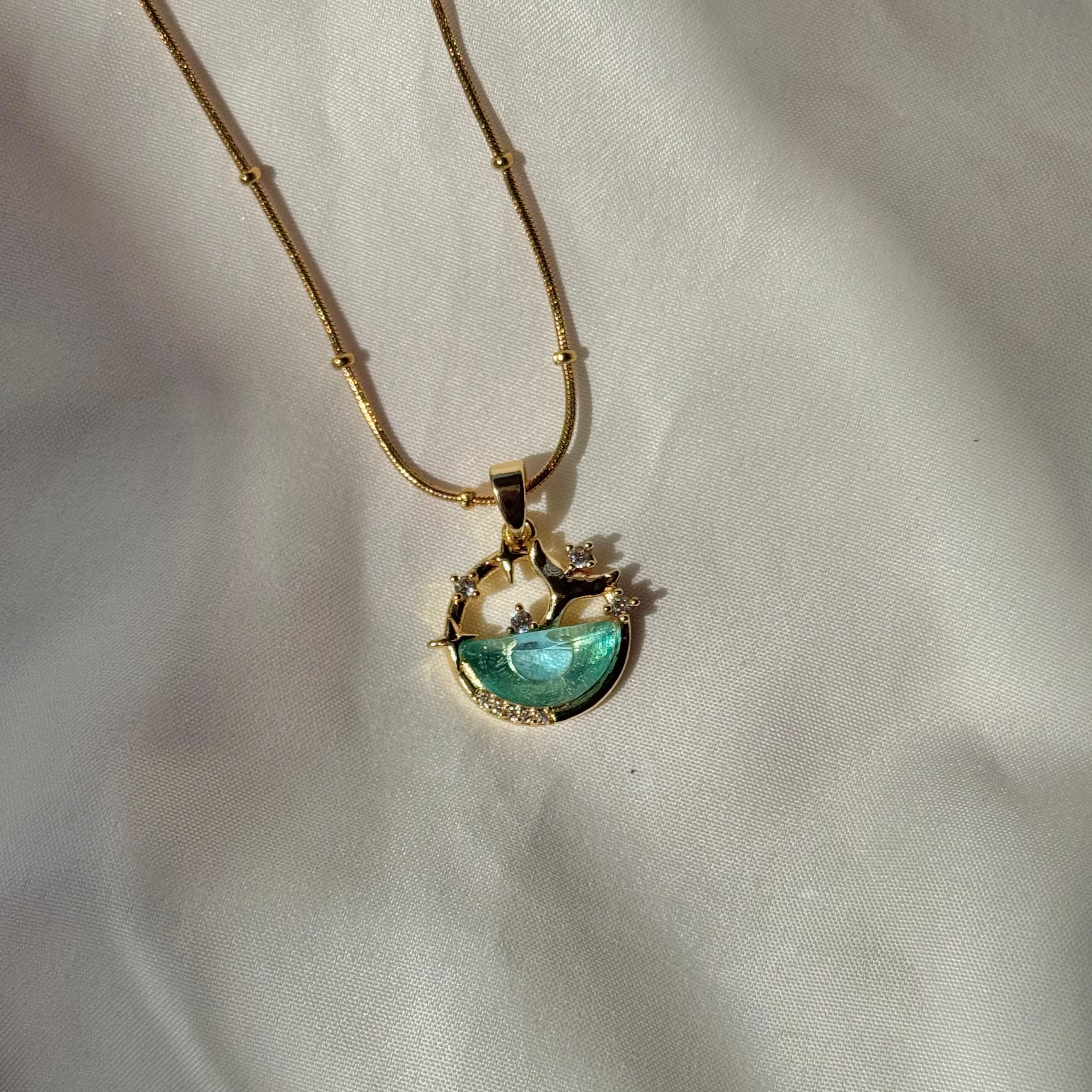Ocean dolphin tail necklace
