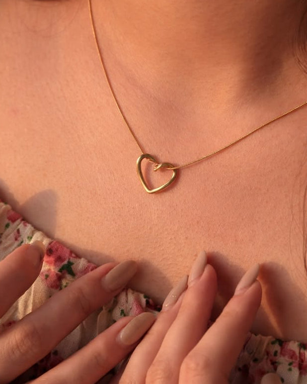 String heart necklace