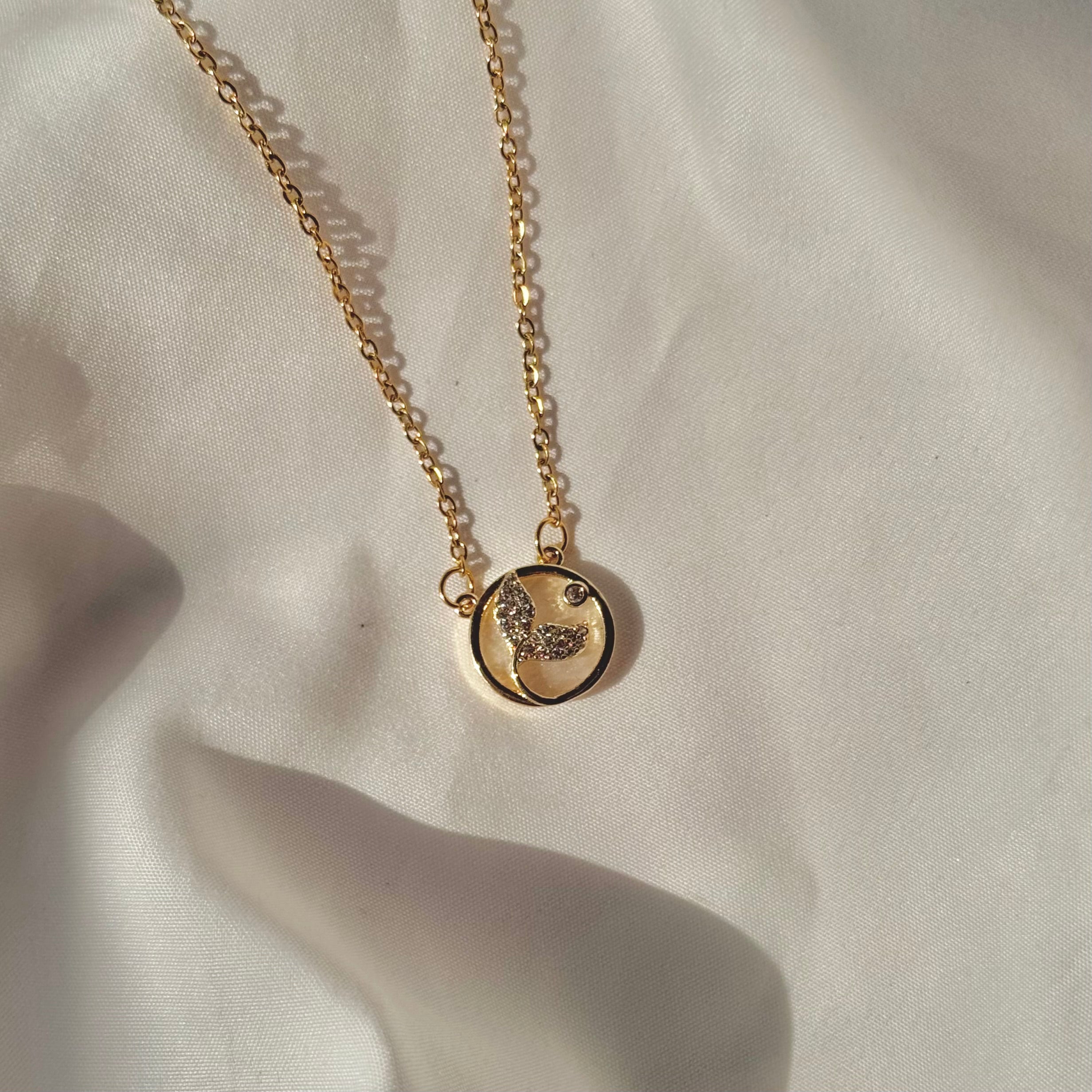 Shall Dolphin Tail Necklace