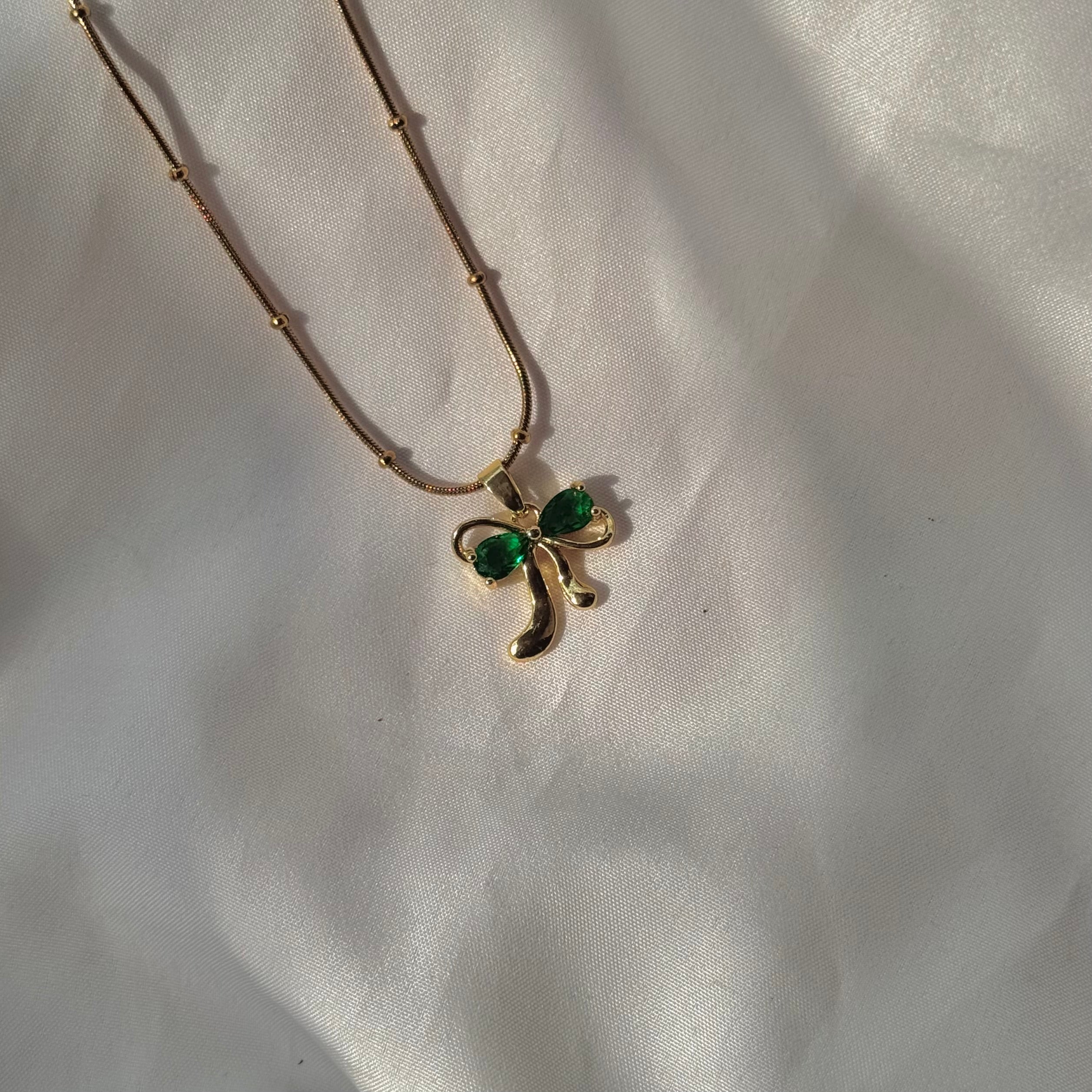 Diamond bow necklace