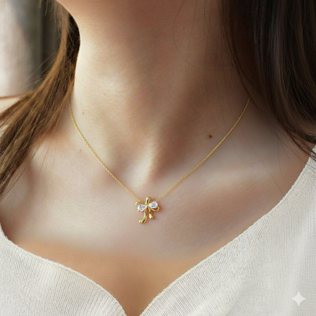 Diamond bow necklace